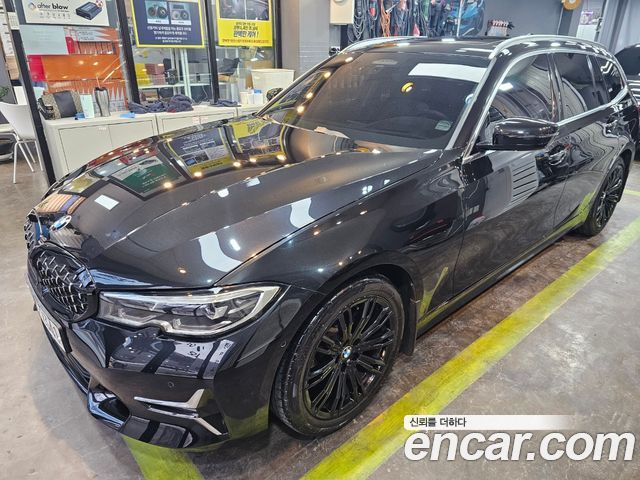 BMW 3-Series 320i Touring Luxury 2021 года из Кореи