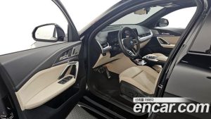 BMW iX2 eDrive 20 M Sport 2024 года из Южной Кореи